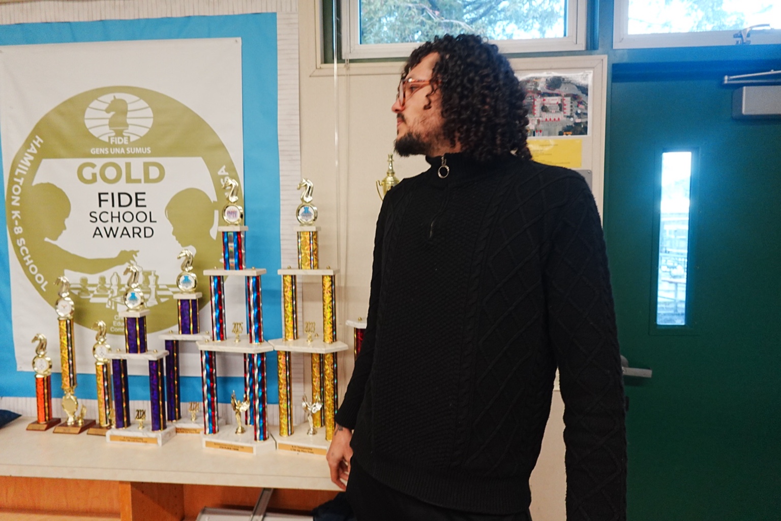 Group photo with medals and trophy