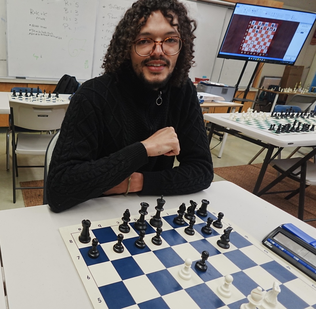 Students competing in a chess class
